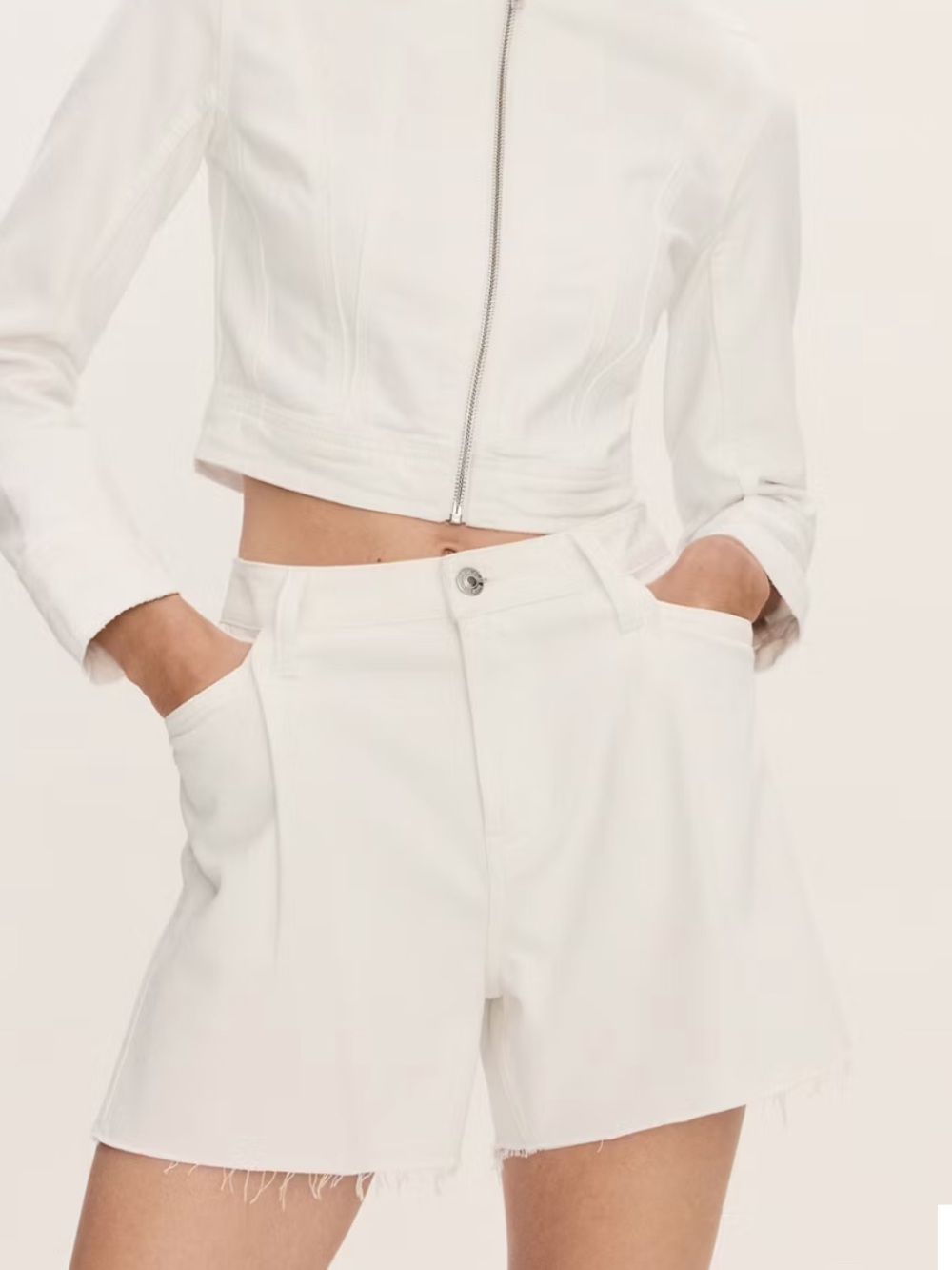 Denim shorts with frayed hem